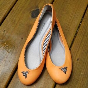 Anthropologie orange flats with bee charms